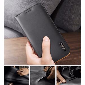 Dux Ducis Hivo Nahka Flip Cover Aitoa nahkaa Lompakko korteille ja asiakirjoille iPhone 14 Pro Max Ruskea