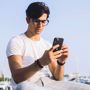 Spigen Glas.tR EZ Fit Optik kamerasuoja iPhone 14 / Plus / 15 / Plus - musta 2 kpl.