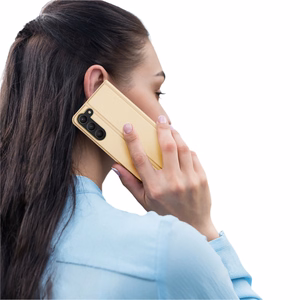 Dux Ducis Skin Pro Suojakuori Samsung Galaxy S23+:lle - läppäkuori korttilompakko jalusta kultainen